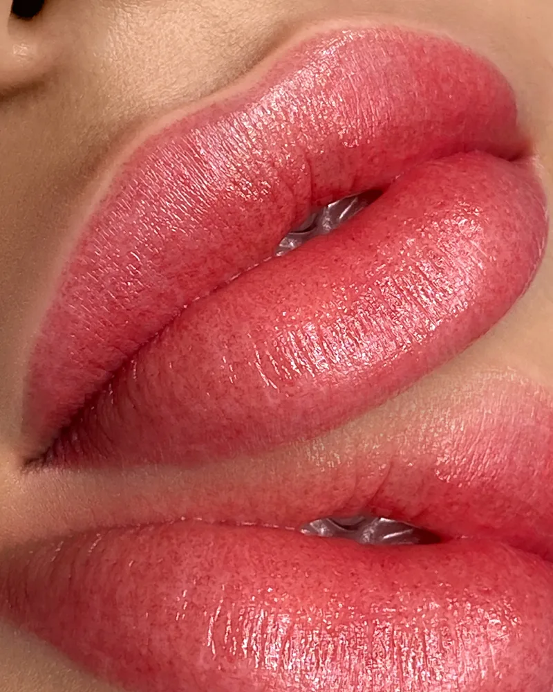 Lip blush result with even, rosy color